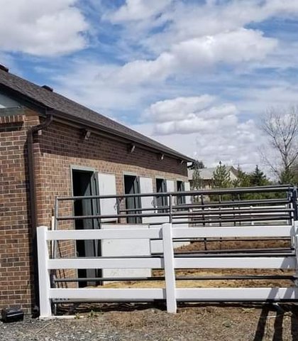Gutters on a brick ranch building on a rural property