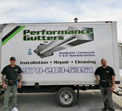Owner Rob Ware and the Performance Gutters crew with the company truck